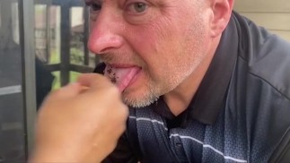 Goddess uses slave as ashtray